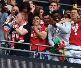  ?? ?? Steve Cooper kisses the trophy after Forest’s win at Wembley