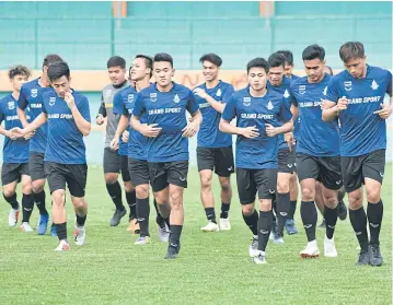  ??  ?? Thai players take part in a training session yesterday.