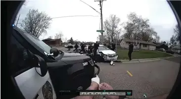  ?? Court TV, via AP, Pool ?? In this image taken from Brooklyn Center Police Officer Jeffrey Sommers’ police body cam video that was played during the trial of former Brooklyn Center police Officer Kim Potter on Thursday in Minneapoli­s, police approach the car that Daunte Wright was driving after being shot during a traffic stop. Potter, who is white, is charged with firstand second-degree manslaught­er in the shooting of Wright, a Black motorist, in the suburb of Brooklyn Center. Potter has said she meant to use her Taser — but grabbed her handgun instead — after Wright tried to drive away as officers were trying to arrest him.