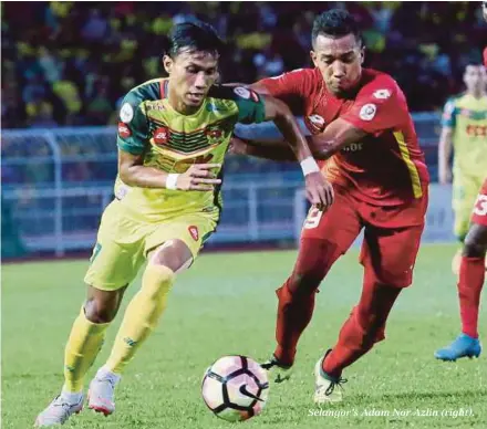  ??  ?? Selangor’s Adam Nor Azlin (right).