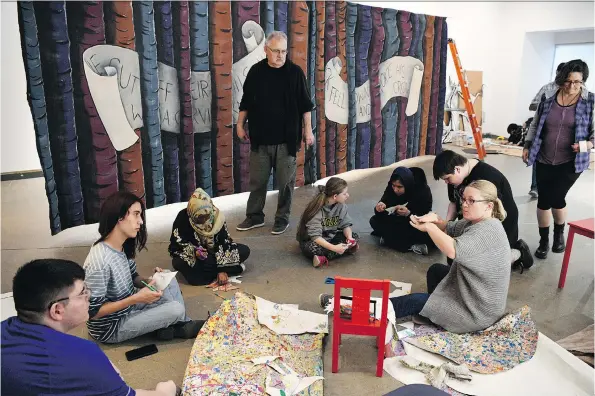  ?? PHOTOS: TROY FLEECE ?? The Deaf Forest is a “powerful” experience, says one of the teachers in the program, Michelle Grodecki. Above right, she explains to students how to make paper birds.