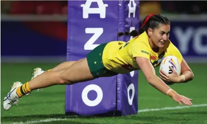  ?? ?? Olivia Kernick scores Australia’s 13th try in the one-sided Women’s Rugby League World Cup game in York. Photograph: George Wood/ Getty Images for RLWC