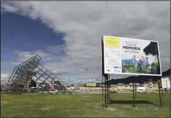  ?? Associated Press ?? A sign announces the spot where Colombia’s government plans to build a museum paying homage to the many victims of the country’s long civil conflict in Bogota, Colombia, Tuesday, Dec. 17, 2019.