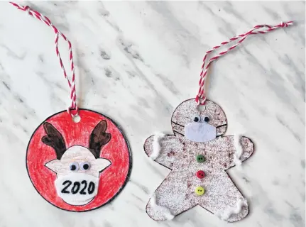  ?? GINA BELL ?? Consider adding a 2020 “twist” by creating paper ornaments wearing masks.