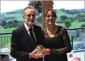  ??  ?? Wicklow G.C. President Billy Alexander with President’s Prize to Ladies winner Amanda Reynolds.