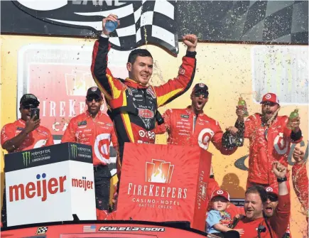  ?? MIKE DINOVO/USA TODAY SPORTS ?? Kyle Larson celebrates after the 2017 FireKeeper­s Casino 400 at Michigan Internatio­nal Speedway, where he has won its past three Monster Energy NASCAR Cup Series races.