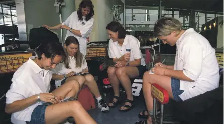  ?? GETTY IMAGES ?? Megan Compain, left, and Tall Ferns team-mates Kirstin Egan, Belinda Jane, Donna Loffhagen and Belinda Colling before heading offshore in 1998.