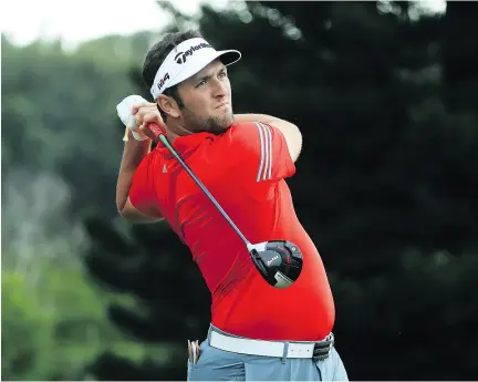  ?? SAM GREENWOOD / GETTY IMAGES. ?? Jon Rahm, seen during the Sentry Tournament of Champions on Sunday in Lahaina, Hawaii, earned a degree in communicat­ions from Arizona State University before his climb to No. 3 in the world.