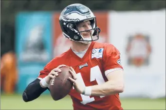  ?? MATT ROURKE | AP ?? CARSON WENTZ has returned from injury but has yet to play for the Eagles. How cautious will the team be with Wentz? Time will tell.