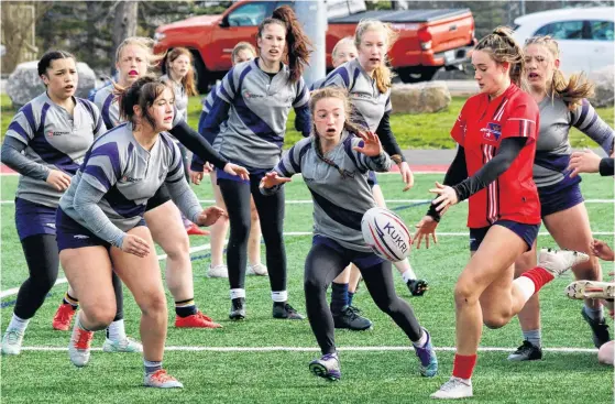  ?? PHOTOS BY CAROLE MORRIS-UNDERHILL ?? As Avon View made a play near King’s-Edgehill’s end zone, Jill Griffin booted the ball away.