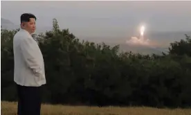  ?? Photograph: AP ?? In a photo provided by the North Korean government, Kim Jong Un inspects a missile test at an undisclose­d location.