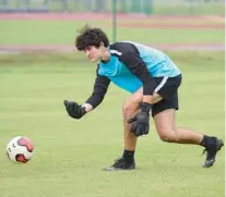  ?? RICARDO RAMIREZ BUXEDA/ORLANDO SENTINEL ?? Trinity Prep senior goalkeeper Shane Wright signed with the UCF men’s soccer program. He had a big year punting as a football player in the fall.