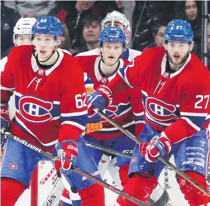  ?? JOHN MAHONEY ?? Canadiens Artturi Lehkonen, left, Daniel Carr, centre, and Alex Galchenyuk screen New York Islanders goaltender Thomas Greiss during the second period at the Bell Centre on Monday. Greiss was busy on Monday, facing 56 shots, but he earned the win in...