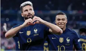  ?? Photograph: Soccrates Images/Getty Images ?? Olivier Giroud (left) celebrates scoring for France against Austria with his teammate Kylian Mbappé, who also was on the scoresheet.