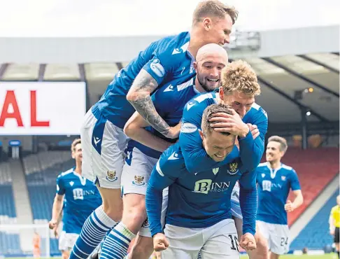  ??  ?? HUGS OF JOY: Glenn Middleton is mobbed by his team-mates after scoring St Johnstone’s second semi-final goal.