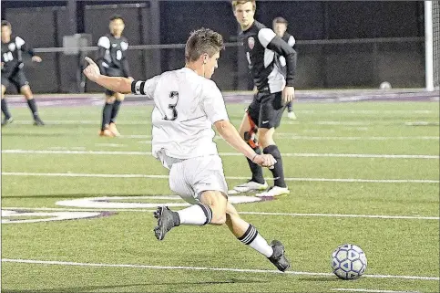  ?? Bud Sullins/Special to Siloam Sunday ?? Siloam Springs senior Austin Shull takes a free kick against Grove, Okla., on March 6 at Panther Stadium.