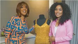  ?? CBS NEWS ?? Gayle King, left, and Angela Bassett are seen with the actor’s costume from the 1993 biopic “What’s Love Got to Do With It” on “CBS Mornings.”