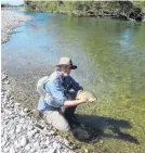  ?? PHOTO: SUPPLIED ?? Bruce Quirey, my companion on the Mataura, with a nice trout on a perfect day.