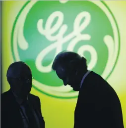  ?? ASSOCIATED PRESS FILES ?? This week’s deal, which saw a Canadian company, Element Financial Corp., obtain GE assets is only part of a streak of mergers and acquisitio­ns that is making the global financial community take notice.