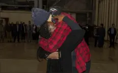  ?? Miguel A. Negron/U.S. Army via AP ?? This photo provided by the U.S. Army shows Brittney Griner, right, being greeted by her wife, Cherelle, on Dec. 9 after arriving at Kelly Field in San Antonio following her release in a prisoner swap with Russia.