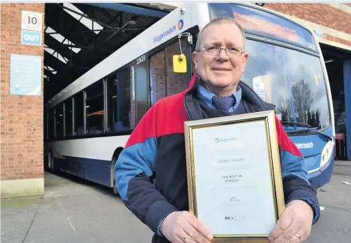  ??  ?? Stagecoach driver Robert Stacey from Stroud receives elite driver status