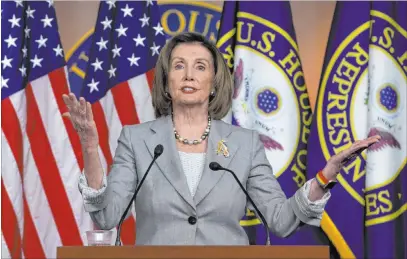  ?? Jose Luis Magana The Associated Press ?? Speaker of the House Nancy Pelosi, D-calif., addresses her weekly news conference Thursday on Capitol Hill. The House approved Medicare prescripti­on drug price legislatio­n Thursday, but the measure is unlikely to clear the Senate.