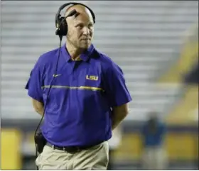  ?? HILARY SCHEINUK—ASSOCIATED PRESS ?? In this April 22, 2017 file photo then-LSU offensive coordinato­r Matt Canada coaches in the first half of the team’s spring game, in Baton Rouge, La. Placing a priority on player safety after the death of Jordan McNair, Maryland interim coach Canada has taken significan­t steps to ensure that the Terrapins are poised to deal with the heat of summer.