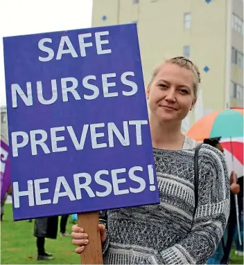  ?? EMILY FORD/STUFF ?? Counties Manukau nurse Caitlin Francey protesting before the pay deal. Her DHB is one of only three that have not bought the staffing program TrendCare.