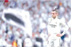  ??  ?? Gareth Bale is struggling to make an impact at Real Madrid this season. - AFP photo