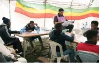  ?? (Maheder Haileselas­sie Tadese/Reuters) ?? STAFF MEMBERS from the National Election Board of Ethiopia and observers count ballots at a polling station after the Ethiopian parliament­ary and regional elections, in Addis Ababa last month.