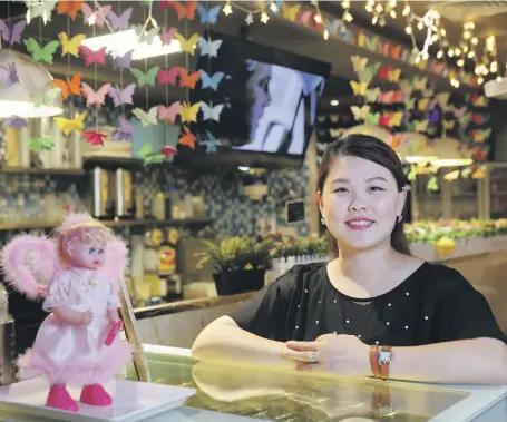  ?? Chris Whiteoak / The National ?? Jiang Yanying at her Friendship Cafe in Dubai that sells fresh Asian sweets and a selection of hot drinks