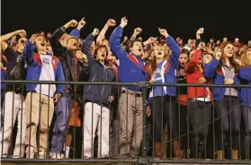  ?? LANCE IVERSEN / THE CHRONICLE ?? St. Ignatius students celebrate their 21-14 win over rivals Sacred Heart in the Central Coast Section Division III championsh­ip game at AT&T Park on Dec. 3, 2011.