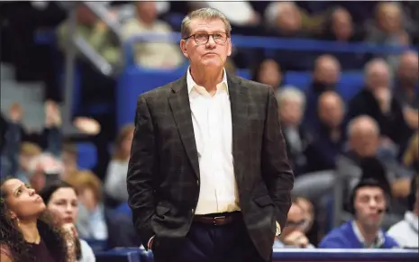  ?? Associated Press file photo ?? UConn women’s basketball coach Geno Auriemma said the team is dealing with one positive test for COVID-19 but that the person who tested positive is not a player or a coach.