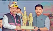  ?? — PTI ?? Union home minister Amit Shah with Arunachal Chief Minister Pema Khandu during a rally in the Arunachal Pradesh’s town Namsai on Sunday.