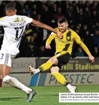  ?? PICS: RICHARD BURLEY, EPIC ACTION IMAGERY ?? Jonny Smith pounces to put Burton Albion 3-0 up shortly after half-time.