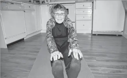  ?? JIM DAY/SALTWIRE NETWORK ?? Shirley Horne, 90, of Charlottet­own hits the yoga mat every night for at least 30 minutes. She also likes to walk and peddle a stationary bike to keep fit.