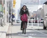  ?? BERNARD WEIL/TORONTO STAR ?? Bike ridership in Toronto spiked when the Bloor St. lanes opened, according to the City of Toronto.