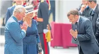  ??  ?? French President Emmanuel Macron with the Prince of Wales and Duchess of Cornwall