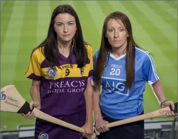  ??  ?? Wexford captain Bríd Gordon with Dublin’s Síle Nic Coitir. Photograph: INPHO/Morgan Treacy.