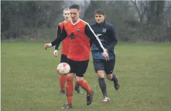  ??  ?? Ayton Reserves’ goalscorer Liam Scott gets on the ball