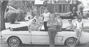  ?? GAIL WISE ?? The Wise family shot a Christmas card picture in July 1979 with the Mustang. Shortly after, Tom pushed the car into the garage, where it sat for 27 years.