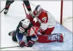  ?? JASON FRANSON — THE CANADIAN PRESS VIA AP ?? Flyers prospect Bobby Brink (24) slides into Czech Republic goalie Lukas Parik, right, for the U.S. during the second period at the IIHF World Junior Hockey Championsh­ips in Edmonton, Alberta.