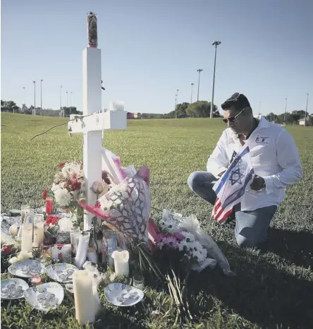  ??  ?? The Florida town of Parkland is in mourning after the killing of 17 students at Marjory Stoneman Douglas High School