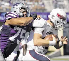  ?? AP FILE ?? Former Kansas State defensive end Jordan Willis (75) displays the type of quick first step the Falcons seek in pass rushers. He had 11.5 sacks last season.