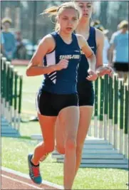  ?? BARRY TAGLIEBER - FOR DIGITAL FIRST MEDIA ?? Spring-Ford’s Bella Marchini races to victory in the 3,200 meters during a PAC dual against Methacton Wednesday.