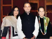  ??  ?? The author (left) seen with Rahul and Sonia Gandhi.