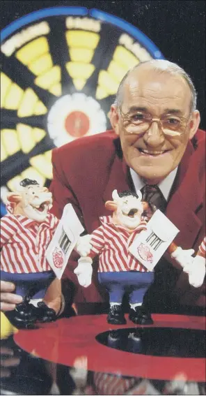  ?? PICTURES: PA WIRE. ?? GOOD ARROWS: Jim Bowen presenting his famous quiz show Bullseye which combined darts and general knowledge with the famous Bully mascots, which all contestant­s took home.