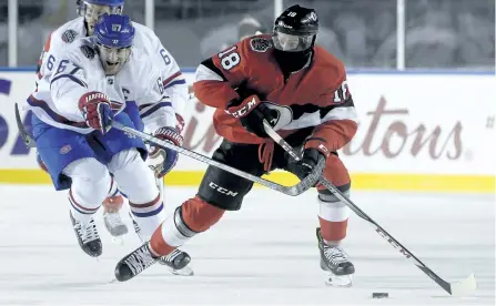  ?? ADRIAN WYLD/THE CANADIAN PRESS ?? Montreal Canadiens left wing Max Pacioretty tries to chase down Ottawa Senators left wing Ryan Dzingel during second period hockey action at the NHL 100 Classic, in Ottawa on Saturday, Dec. 16.