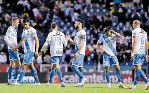  ?? / EFE ?? Hora de remontar en el Puebla tras quedarse con las ganas de festejar en la ida