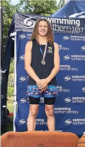  ?? ?? Sam Wells on the podium after finishing second in the individual medley. Sam achieved a podium finish in five separate events.